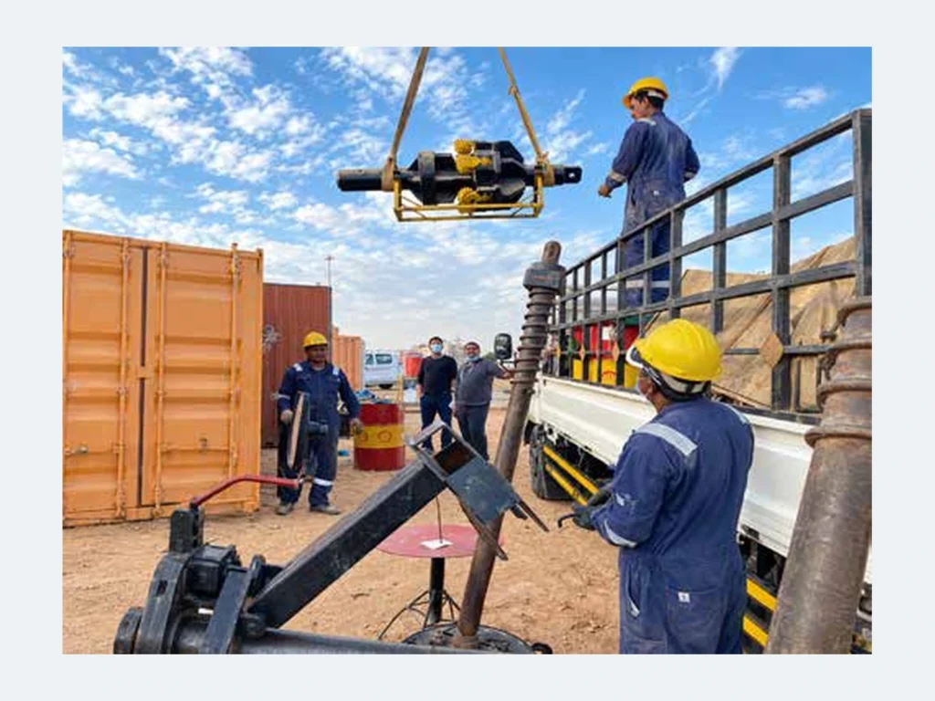 Crew handling a DRILLNOVA bolt-on hole opener at an HDD jobsite