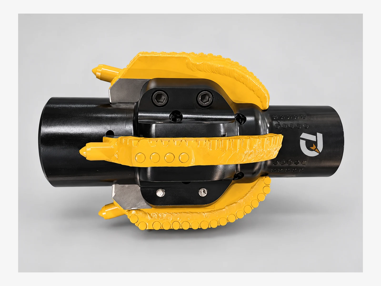 Full side view of a black Bolt-On PDC Reamer fitted with yellow replaceable cutter wings.