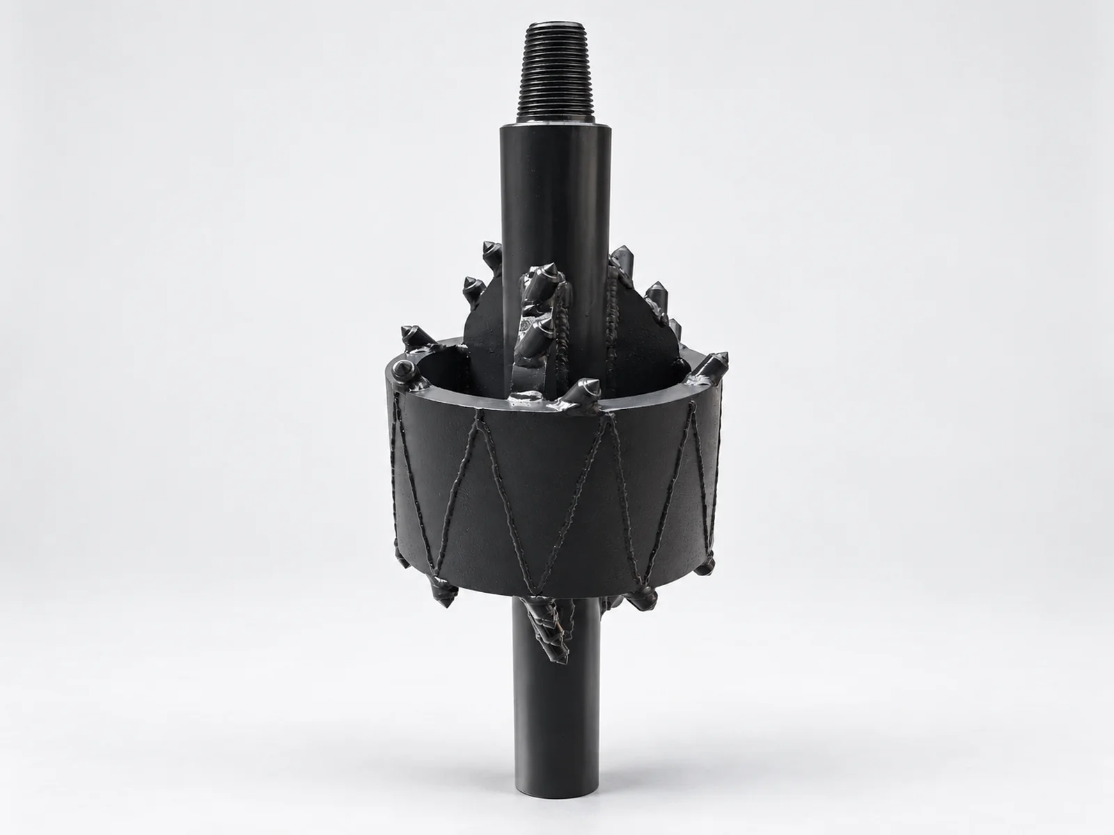 Front view of a black Fly Cutter Reamer with a circular cutter body and carbide cutting teeth.