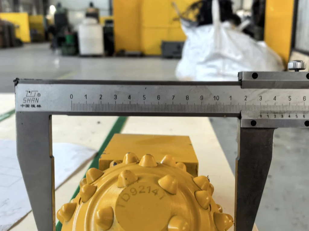 Roller cone cutter dimensional inspection using a precision caliper