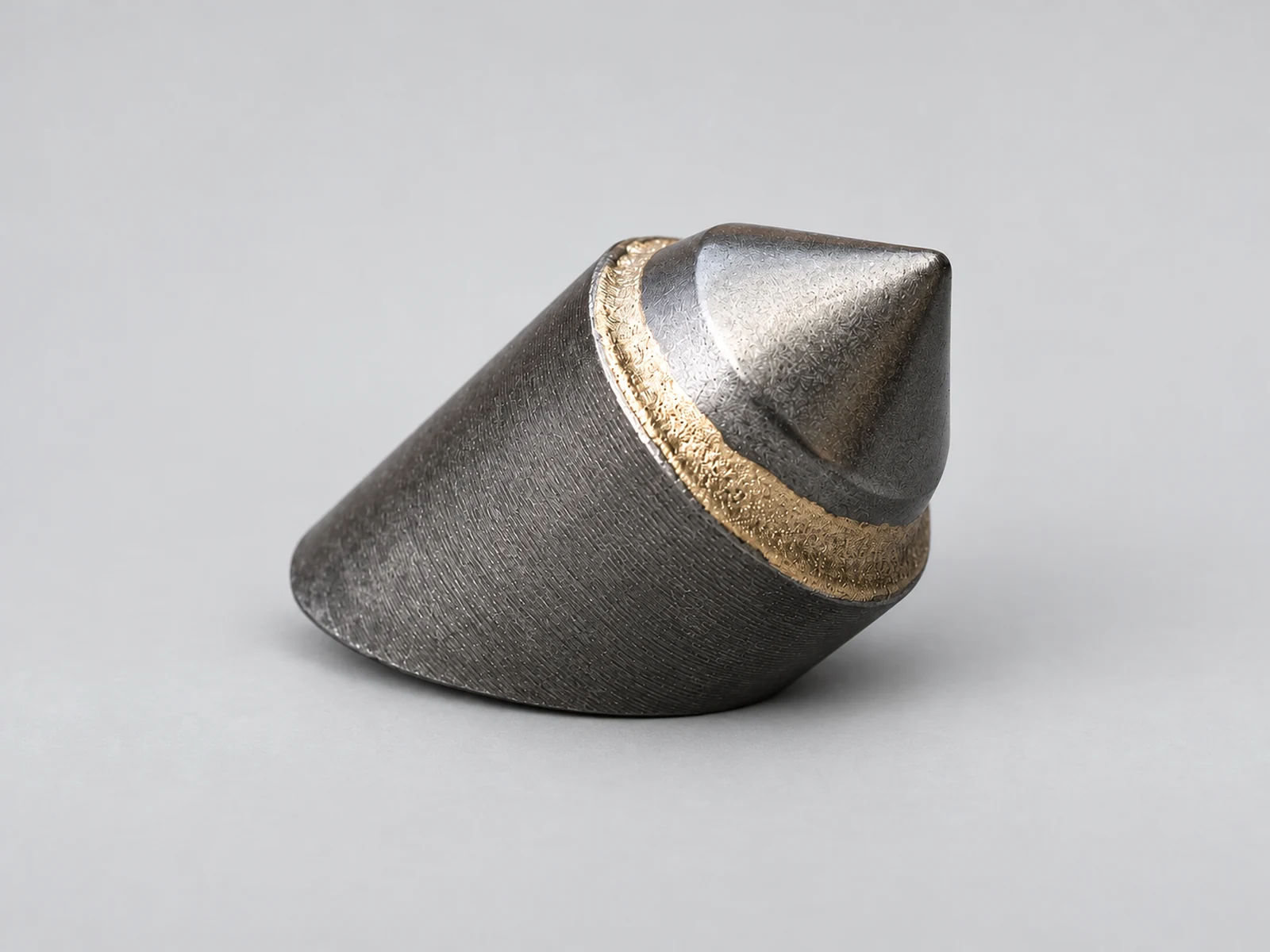 DR1 weld-on tooth with carbide tip and brazed joint on a light gray background